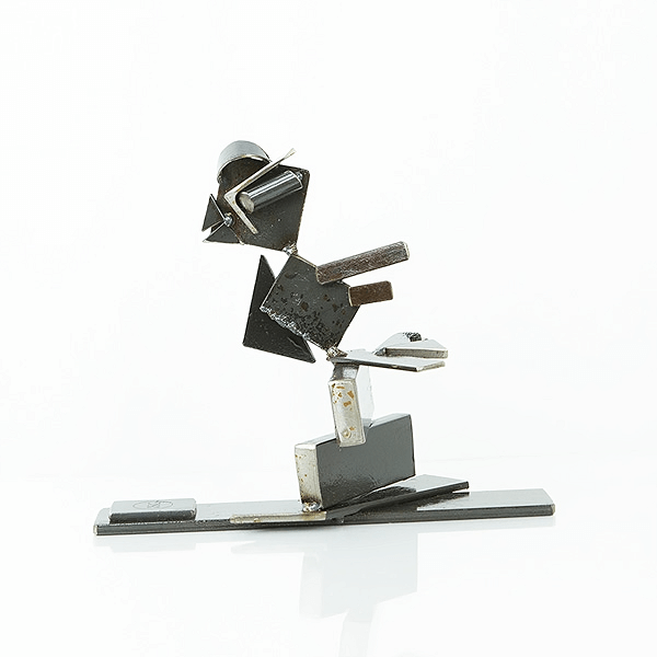 metal sculpture of a black capped chickadee