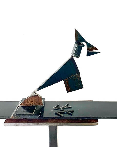 metal sculpture of a blue jay bird