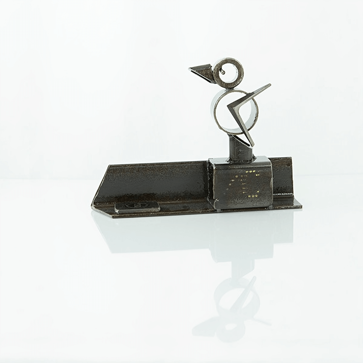 metal sculpture of a gosling bird