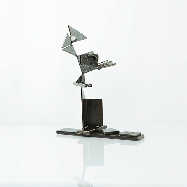 metal sculpture of a tufted titmouse bird