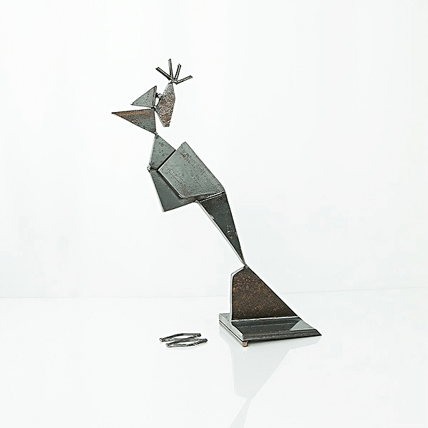 metal sculpture of a Woodpecker