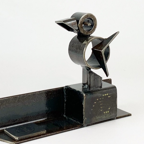 metal sculpture of a gosling