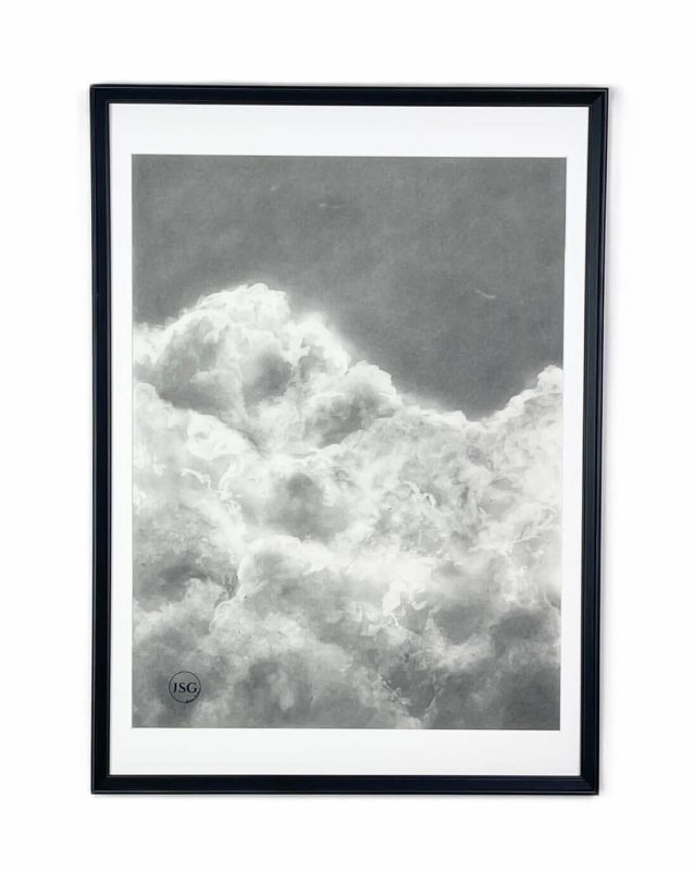 charcoal drawing framed at 21" x 29". This serene artwork captures the soft, airy beauty of drifting clouds, adding a touch of calm and elegance to any space.