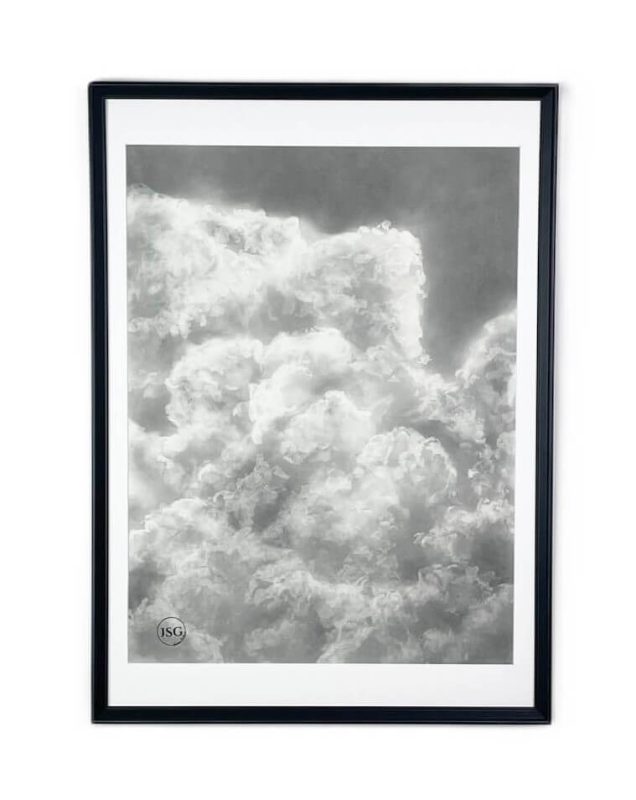 charcoal drawing framed at 21" x 29". This serene artwork captures the soft, airy beauty of drifting clouds, adding a touch of calm and elegance to any space.